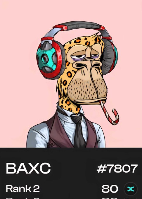 The image features a cartoon monkey wearing headphones, standing against a pink background with a caption that reads "New ATH BAXC sale!! Congrats @mariusbedreag ... Nft's are dead..? @MultiversX @xPortalApp @XoxnoNetwork @OnionXLabs". The monkey is dressed in a suit and tie, giving it an air of sophistication. The caption also mentions that the monkey has a rank of 2 out of 2.