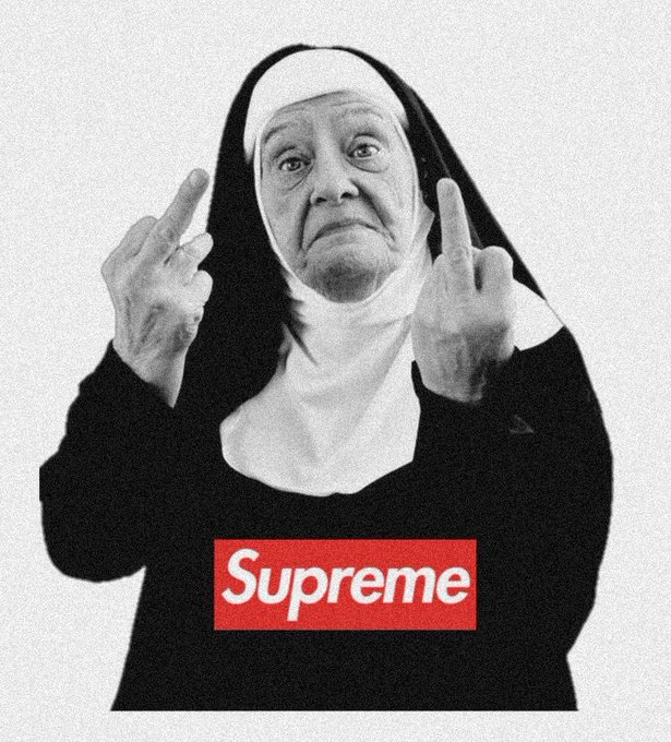 A black and white image of a nun making middle finger gestures with both hands, wearing a black top featuring a red Supreme logo box.