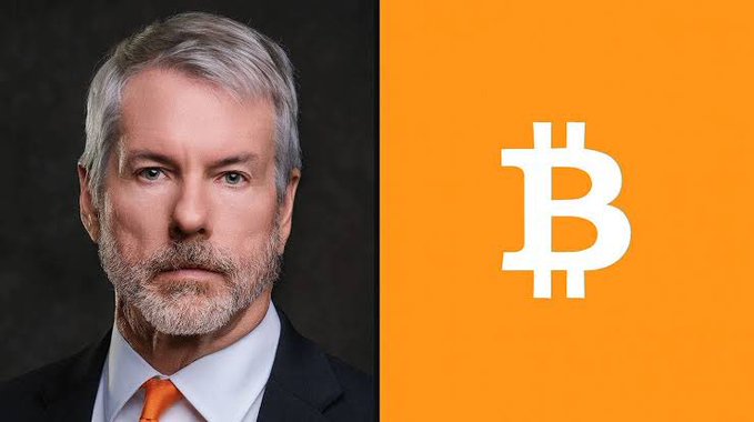 In this image, there are two men wearing suits and ties against a black background. One of them has white hair that adds an older appearance to his image. The man with the white hair appears to be a businessman or perhaps even a lawyer given the context provided in the caption. 

The main visual element in the image is a picture featuring the Bitcoin logo, which consists of the letter "B" rendered in the same color as the background. This logo, often associated with digital currency, adds an interesting contrast to the image's focus on the two men in suits.