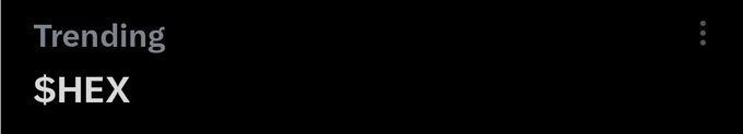 The image displays the word "Trending" in faded gray text above "$HEX" in bold white lettering against a black background. The post celebrates $HEX as trending again, and the image's minimalist design with the prominent "$HEX" label visually reinforces the token's current trending status in the crypto market.