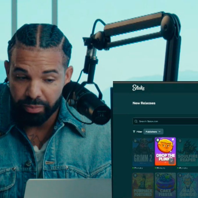 A bearded man with braided hair sits in front of a podcast microphone, staring intensely at a laptop screen displaying the Stake.com "New Releases" page, which prominently features the game "Drop the Plink..." alongside titles like "Grimm 2," "Soul Fire Reaper," "Pumpkin Fortunes," "Cake Fiesta," and "Mad Genius." The meme captures his laser-focused, almost meditative expression as he prepares to chase a massive 100,000x multiplier on the plinko game.