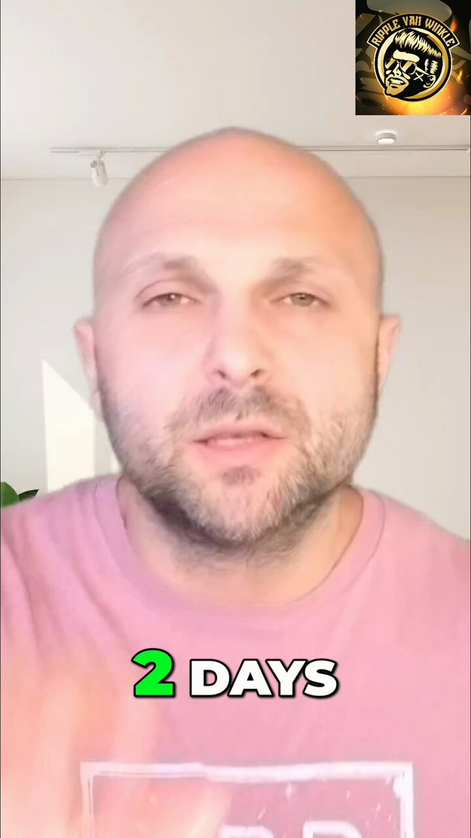 The image features a bald man wearing a pink shirt with the number 2 written on it, who appears to be making a funny face or expressing some sort of frustration. The caption below him reads "2 days", which could possibly be related to an event or news story in the background.