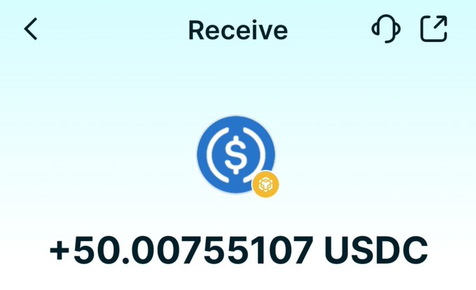 A mobile app screenshot showing a 'Receive' screen with the USDC cryptocurrency logo and the text '+50.00755107 USDC'.