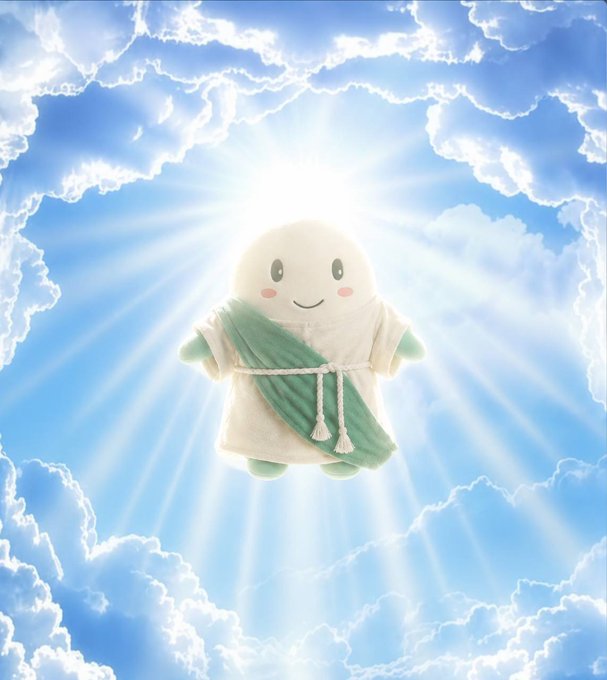 A small plush doll dressed in a white robe with a green sash floats among heavenly clouds, radiating beams of light from above as if ascending into the sky. The image ties into the post by humorously personifying a divine "smiling angel" delivering an emphatic "say no more."