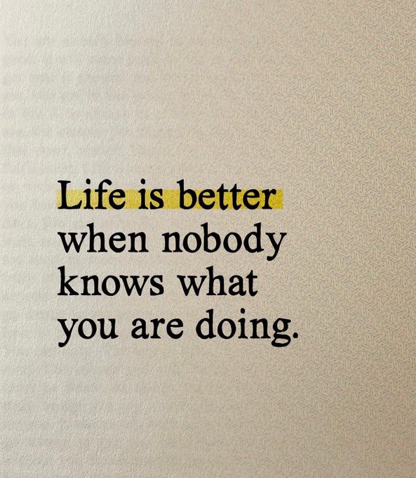 A motivational quote printed on textured paper reading 'Life is better when nobody knows what you are doing.' with 'Life is better' highlighted in yellow.