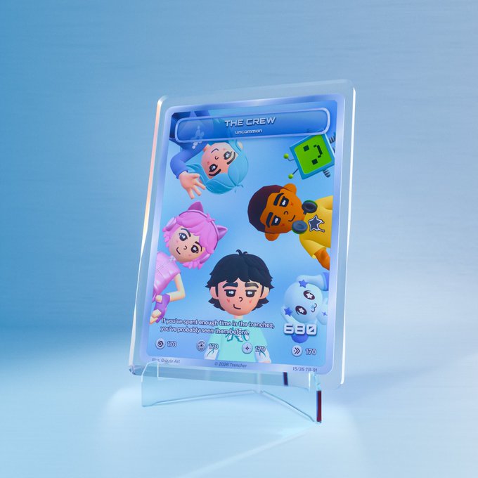 A premium TCG card titled "THE CREW" with the description "NFTs aren't enough. In the metaverse, you're probably seen them before" sits in a display stand, showing 5 stylized character designs with stats totaling 580 and a #10 rarity. The image showcases the high-quality physical card product referenced in the post celebrating the successful public sale.