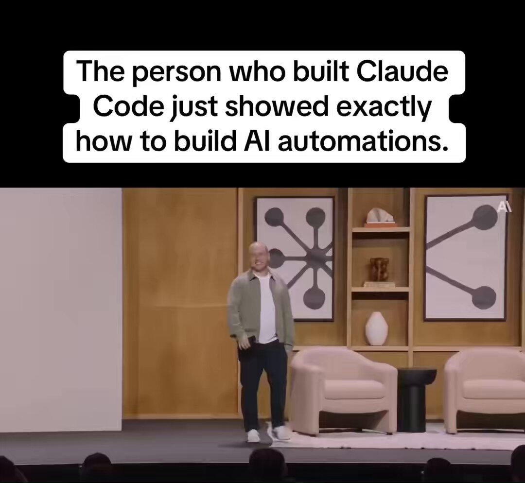 The image shows a man standing on stage, talking about code and its applications. The caption above him reads "The person who built Clause Code just shown exactly how to build AI". This suggests that the speaker is discussing the process of building an artificial intelligence assistant named Clause, which involves using code to create a machine learning system capable of understanding and responding to human language.