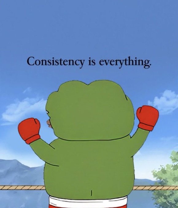 An illustration of a green frog character wearing red boxing gloves and red shorts stands with its back turned against a blue sky, with the text 'Consistency is everything.' displayed above.