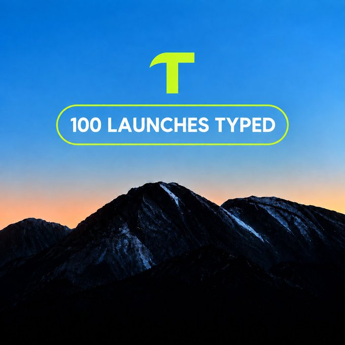 A motivational graphic with a mountain landscape background showing a yellow 'T' logo and the text '100 LAUNCHES TYPED' in a rounded badge.