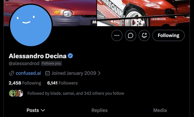 A Twitter/X profile page for 'Alessandro Decina' (@alessandrom) showing a blue smiley face avatar, the bio 'confused.ai', and racing car banner images.