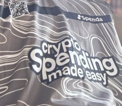 The image features a promotional graphic with the text "Crypto Spending made easy" alongside the Spenda logo and QR code, visually reinforcing the post's message about how Spenda eliminates the stress, scams, and delays of P2P crypto transactions by making crypto spending simple and seamless.