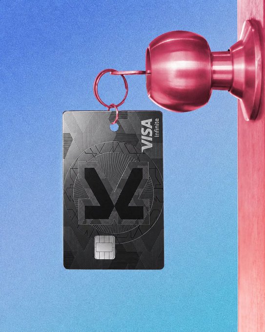 A black Visa Infinite metal credit card featuring a 'VV' monogram design hangs from a red key hook against a blue gradient background.
