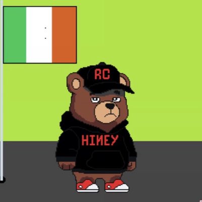 The image features a cartoon bear wearing a black hoodie, red shoes, and a black baseball cap with "RCVRY" written on it. The bear appears to be standing against a green background that includes an Irish flag. The caption of the image reads "I appreciate you #RCVRY".