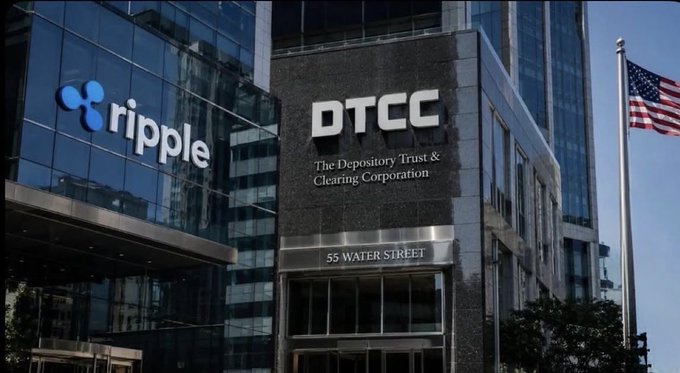 Exterior view of a building featuring signs for 'ripple' and 'DTCC The Depository Trust & Clearing Corporation' at 55 Water Street, with an American flag flying nearby.