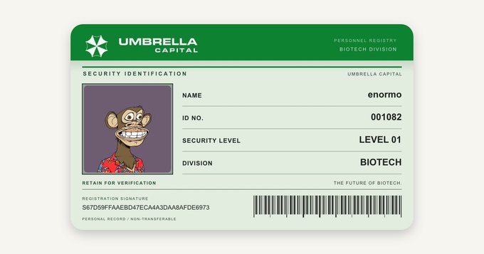 A Resident Evil-themed Umbrella Capital security ID badge for 'enormo' in the Biotech Division with security level 01, featuring a cartoon monkey avatar.
