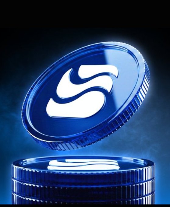 A 3D graphic displays a glowing blue coin with an 'S' logo, likely representing the Sui cryptocurrency, stacked above another coin against a dark blue smoky background.