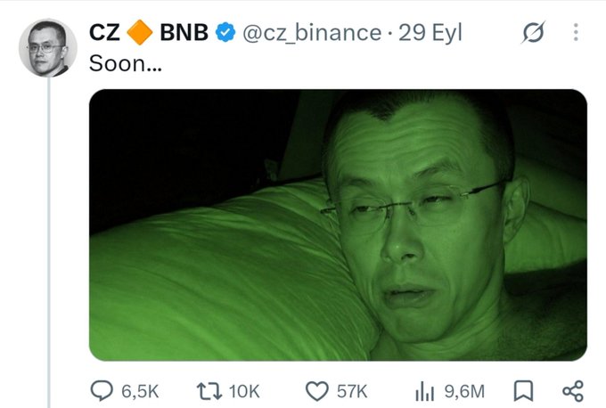 A tweet from CZ (Changpeng Zhao) of BNB (@cz_binance) dated September 29 with the caption "Soon..." shows a close-up, green-tinted selfie of him appearing tired or ill in bed, which has gained 57K likes and 9.6M views. The accompanying post humorously suggests that CZ's ominous "Soon..." posts have a pattern of causing crypto market downturns.