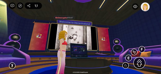 A first-person view inside a virtual 3D room with purple couches and speakers, featuring an avatar labeled 'Ririncrypt#1447' with a speech bubble saying 'Welcome to Decentraland'.