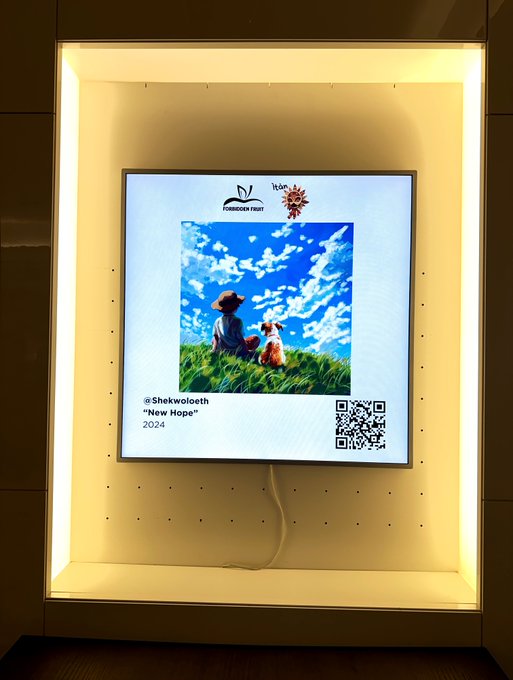 An illuminated display case features a digital poster titled '@Shekwoloeth "New Hope" 2024' showing an illustration of a figure and a dog under a blue sky, alongside a QR code.