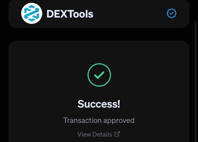 A DEXTools mobile app screen displaying a 'Success! Transaction approved' confirmation with a green checkmark.
