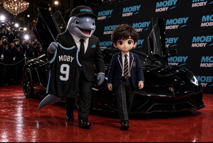 A man in a suit holding a 'MOBY 9' jersey stands beside an anime-style character in a school uniform, posed in front of a black Lamborghini on a red carpet with 'MOBY' branding behind them.