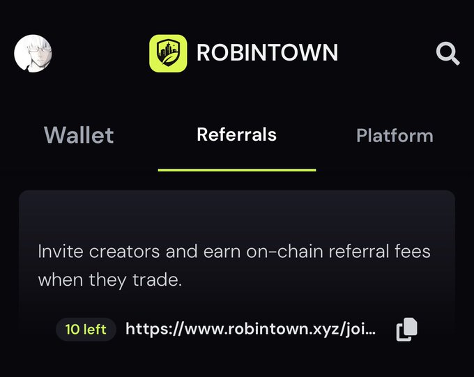 A screenshot of a website called 'ROBINTOWN' showing a 'Referrals' tab with the text 'Invite creators and earn on-chain referral fees when they trade' and a partially visible robintown.xyz link.