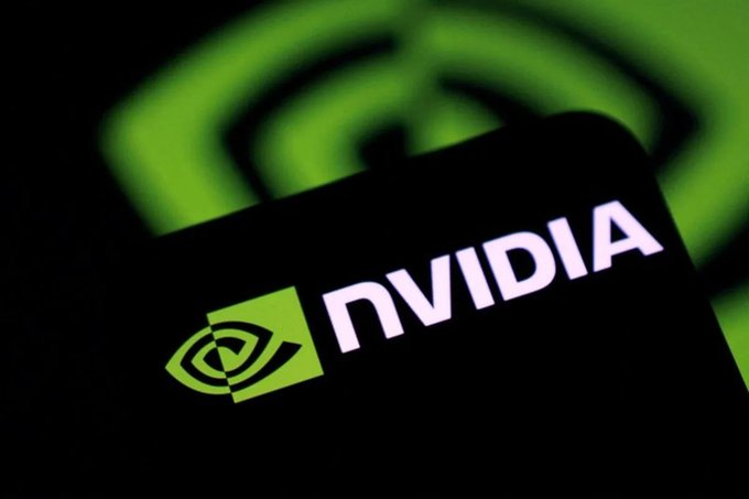 The NVIDIA logo and name displayed on a smartphone screen with a green NVIDIA logo blurred in the background.