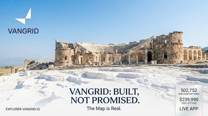 A promotional banner for Vangrid featuring the tagline "VANGGRID: BUILT, NOT PROMISED. The Map is Real." with statistics showing 502,752 on-chain captures and $239,990 USDG settled, alongside an ancient stone amphitheater and the URL EXPLORER.VANGRID.IO.