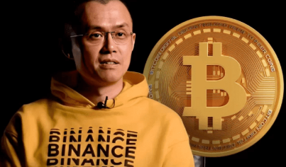 The image shows Changpeng Zhao (CZ), the founder of Binance, wearing a yellow hoodie with "BINANCE" printed on it, positioned next to a large Bitcoin logo against a dark background, visually reinforcing his statement about countries potentially printing unlimited money to acquire Bitcoin.