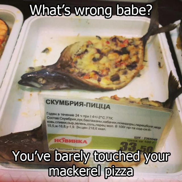 The image features two fish heads, one of which has a pizza cut out of it. The text "What's wrong with this?" suggests there might be an issue or disagreement about something related to the pizza. The rest of the image includes other descriptions that could be related to the fish heads and the pizza, but they are not directly connected to the main subject matter.