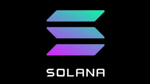 The Solana logo, featuring a stylized gradient 'S' symbol in teal, purple, and pink above the word 'SOLANA' in white text, displayed on a black background.