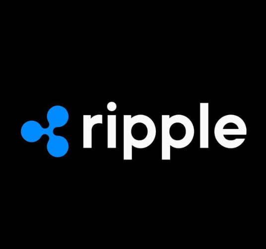 The image displays the Ripple logo, featuring its iconic blue three-circle symbol next to the wordmark "ripple" in white lowercase text on a black background. This branding relates to the post announcing Ripple Prime's new Delta One desk, which expands the company's crypto infrastructure into traditional US stock trading for institutional clients.