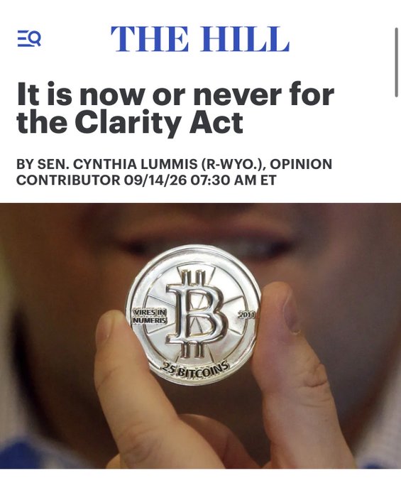 A screenshot of a *The Hill* opinion piece headlined "It is now or never for the Clarity Act" by Sen. Cynthia Lummis (R-Wyo.), dated 09/14/26, featuring a photo of a person holding a physical Bitcoin coin. The article aligns with the post's message endorsing Senator Lummis's efforts to provide regulatory clarity for digital assets in the United States.