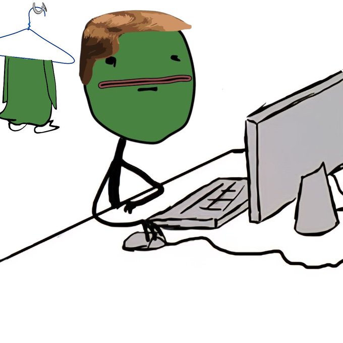 A cartoon drawing of a green-faced character with brown hair sitting at a computer desk with a monitor, keyboard, and mouse, with a green shirt hanging on a hanger in the background.