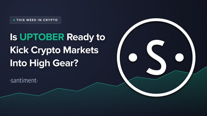 A Santiment "This Week in Crypto" article header asking "Is UPTOBER Ready to Kick Crypto Markets Into High Gear?" displayed next to the company's circular 'S' logo.