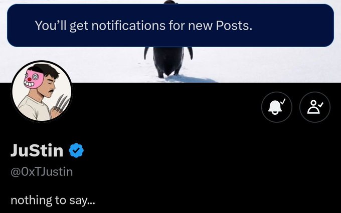 A Twitter/X profile screenshot for 'JuStin' (@0xTJustin) with a verified checkmark, a pink pig-masked avatar, and the bio 'nothing to say...'