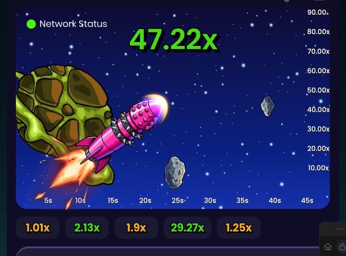 A 'Network Status' screen from a crypto game showing a cartoon rocket flying past a turtle on a space-themed background, displaying a multiplier of '47.22x' along with timing and bet multipliers.