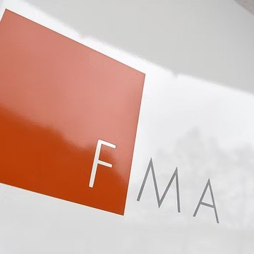 The image shows the FMA (Austria's Financial Market Authority) logo, featuring a red square with a white "F" inside, next to the letters "MA" in a gray, modern font on a white background. This is the regulatory body that issued the €70,000 fine to Bitpanda for late filing of a crypto-asset whitepaper and breaching marketing requirements under the EU's MiCA regulations.
