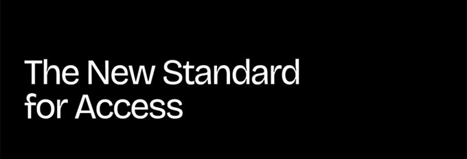 A minimalist black screen displays the white text 'The New Standard for Access'.