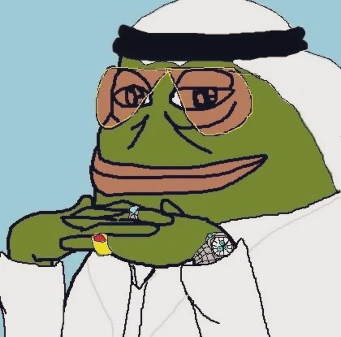 A smug-looking Pepe the Frog dressed in a white thobe and black headband wears gold-rimmed sunglasses and flashy rings, holding a small object in his hands.