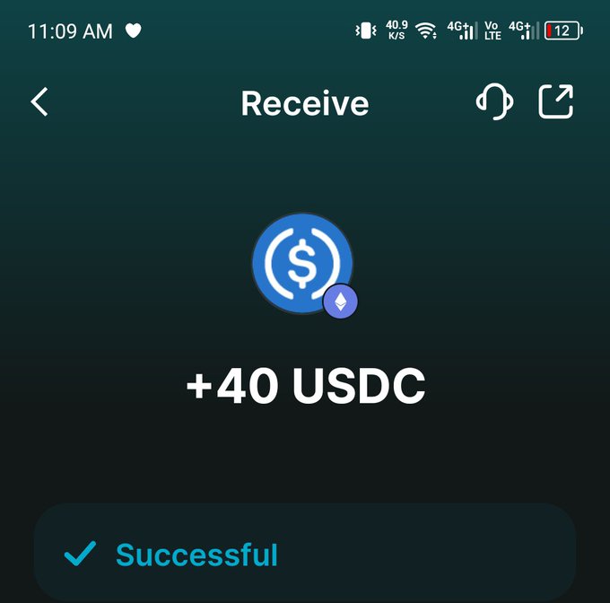 A mobile screenshot of a cryptocurrency transaction showing a successful receipt of +40 USDC on a dark-themed app interface.