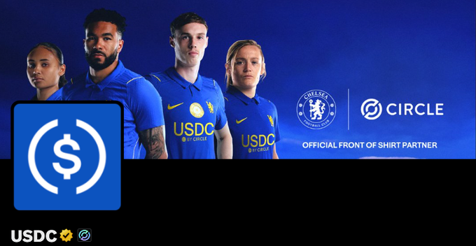 The image is a promotional graphic announcing **Circle** (the issuer of **USDC**) as the **Official Front of Shirt Partner** of **Chelsea Football Club**, featuring players wearing the team's iconic blue jersey with "USDC" printed on the front. In the foreground, the USDC logo—a dollar sign inside parentheses—appears on a matching blue background, highlighting the visual parallel between USDC's signature blue and Chelsea's famous kit color, supporting the post's observation.