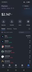 A Phantom cryptocurrency wallet interface showing a Solana balance of $2,147, with holdings in SOL, WIF, ASSCAT, BULCALF, LOCKIN, and SCN20 tokens.