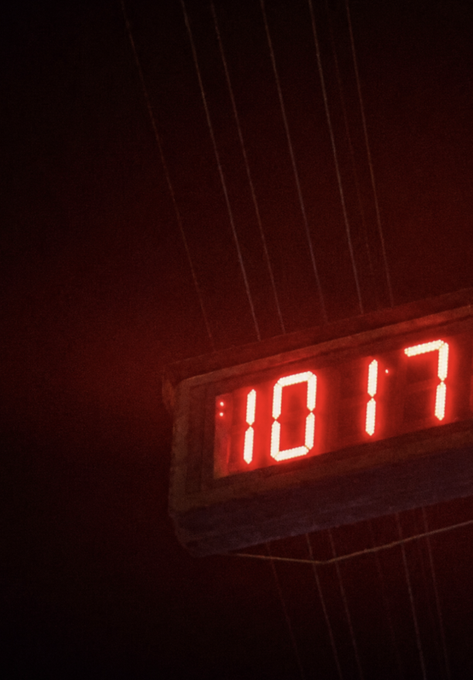 A digital clock glowing red in the dark displays 10:17, suggesting the late hour when the caption warns "If you think you're ready… You're not!" — implying that readiness doesn't truly exist at such an ominous time.