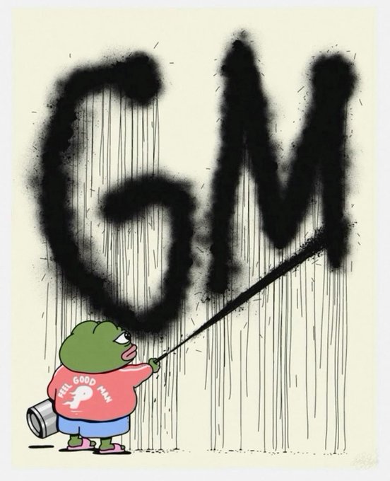 A Pepe the Frog cartoon wearing a pink shirt that says "FEEL GOOD MAN" sprays black graffiti painting the letters "GM" on a wall.