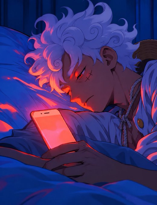 An anime-style illustration of a character with white curly hair and red eyes lying in bed, looking at a glowing smartphone illuminated by warm orange light.