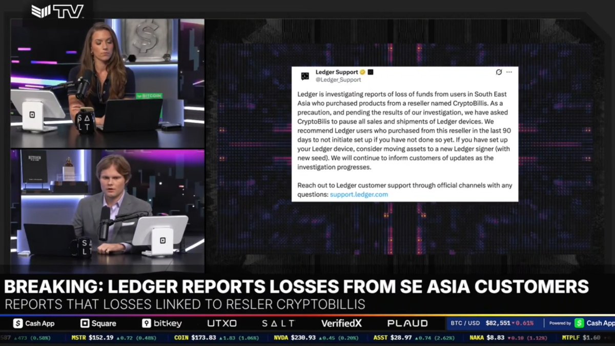 A news broadcast on "The Bitcoin Layer" displays a tweet from Ledger Support reporting an investigation into fund losses affecting South East Asia customers who purchased devices through reseller CryptoBillis, with on-screen banner reading "BREAKING: LEDGER REPORTS LOSSES FROM SE ASIA CUSTOMERS — REPORTS THAT LOSSES LINKED TO RESLER CRYPTOBILLIS," while the bottom ticker shows BTC/USD at $82,551.