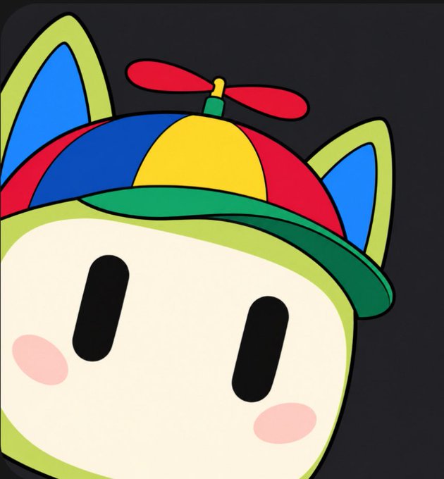 A cartoon app icon featuring a cute character with a white face, black oval eyes, and pink cheek blushes, wearing a colorful propeller beanie hat with blue cat-like ears on a dark background.