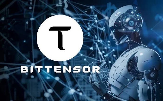 The image features a robot standing next to a white circle with the letter "T" inside of it. The background of the image is black and filled with white dots, giving it an abstract appearance. Below the robot, there's text that reads "Bittensor". This suggests that the image might be related to Bittensor or some other technology-related topic.