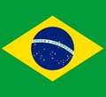 The flag of Brazil featuring a green background, yellow diamond, and blue circle with stars.